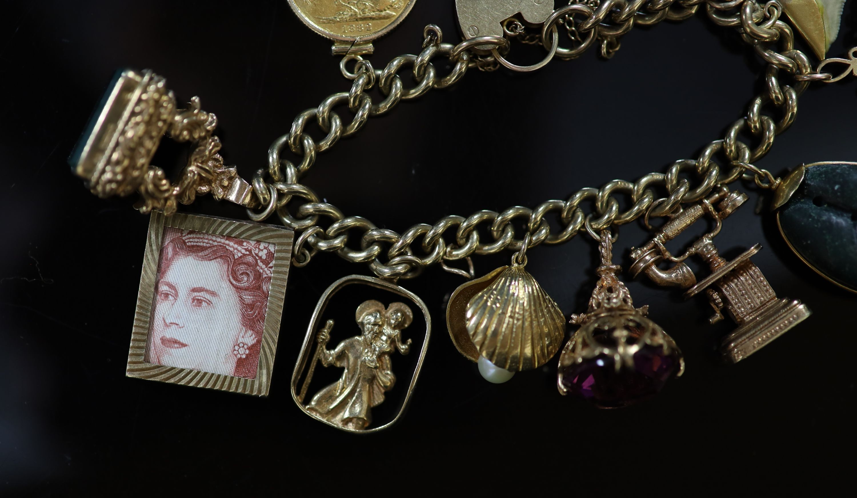 A 1970's 9ct. gold charm bracelet